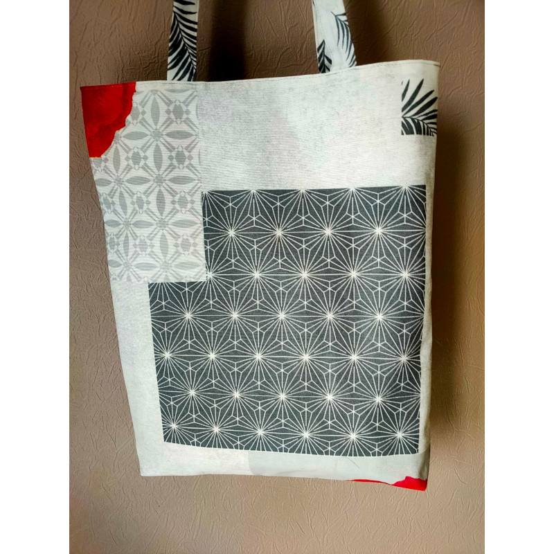 Grand tote bag coquelicot en tissu enduit imperméable avec une poche zippée, verso