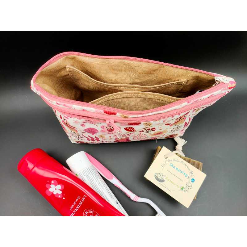 Trousse de toilette hiboux roses intérieur Trousse de toilette hiboux et fleurs roses en tissu enduit imperméable, intérieur.