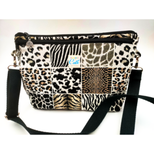 Sac bandoulière léopard en tissu. Poche zippée extérieure et intérieure. Bandoulière réglable.